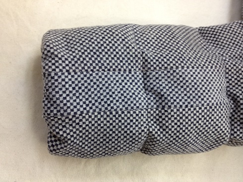 ダウンジャケットの焦げ穴の復元（跡が残る修理）after