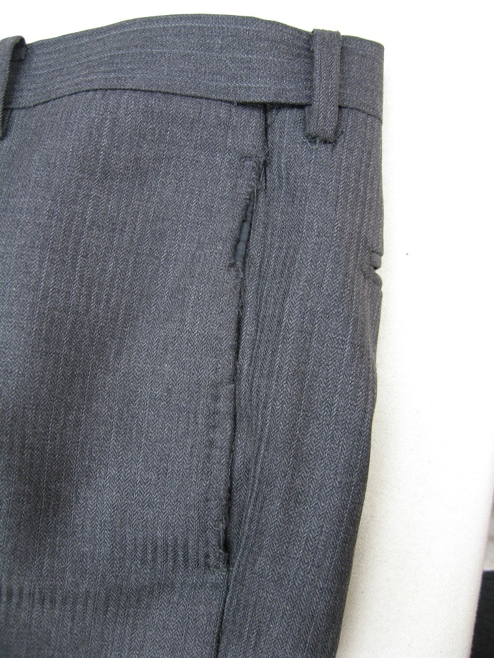 スーツ（パンツ）脇ポケット口の擦り切れ修理before